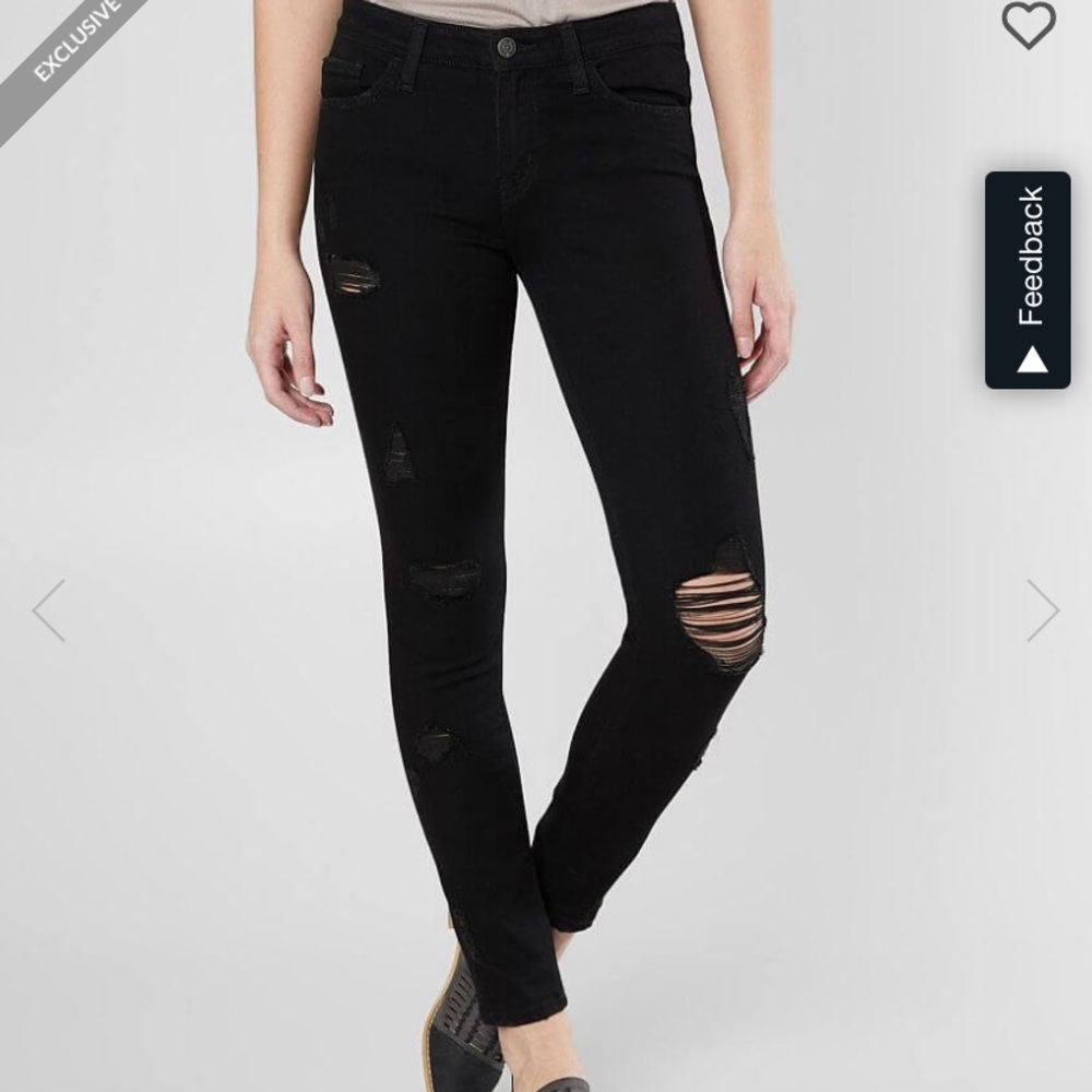 31 MIDRISE BLACK RIPPED JEANS